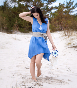 Asymmetrical sleeveless linen tunic decorated with Slavic embroidery of the goddess Mokosz