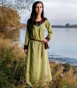 Early medieval linen dress with a round neckline, decorated with linen trim