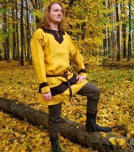 Early medieval linen tunic from Birka decorated with linen trim