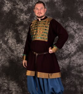 Early medieval royal woolen caftan with linen lining, decorated with natural Oseberg silk brocade